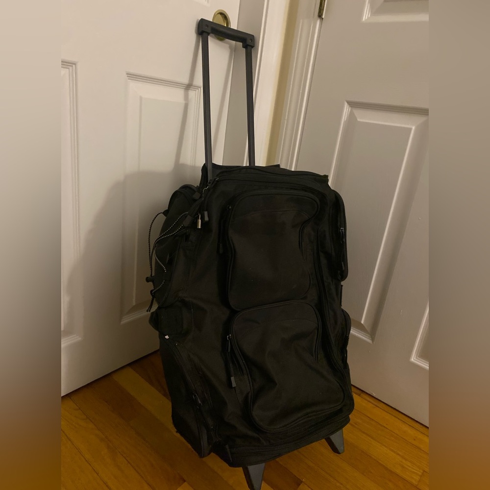 Large duffle bag with wheels/ cosmetology bag